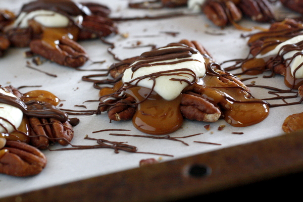 Caramel Pecan Turtle Clusters - You will love these caramel pecan turtle clusters - toasted pecans topped with caramel and two types of chocolate!