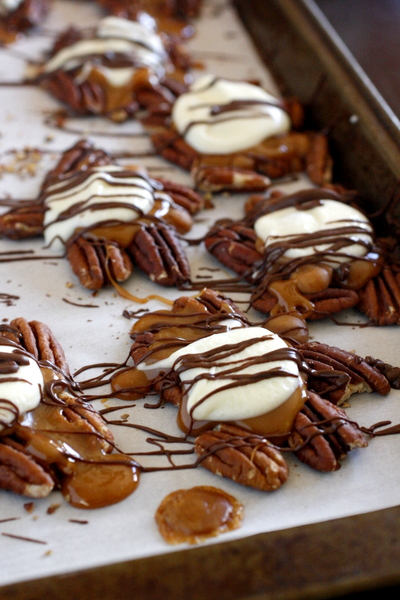 Caramel Pecan Turtle Clusters - You will love these caramel pecan turtle clusters - toasted pecans topped with caramel and two types of chocolate!